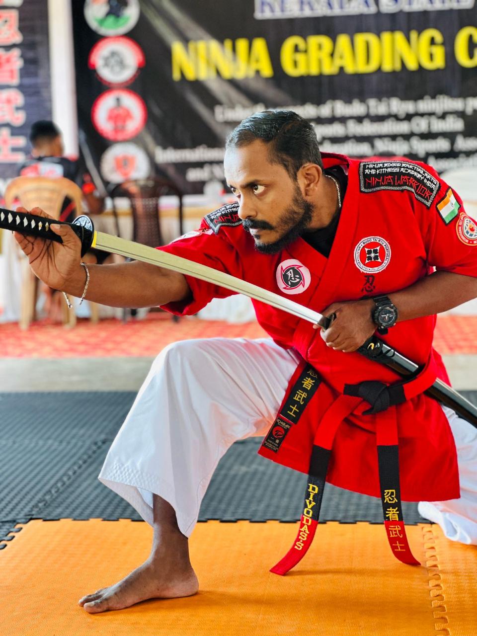 Master Divo Das in martial arts stance